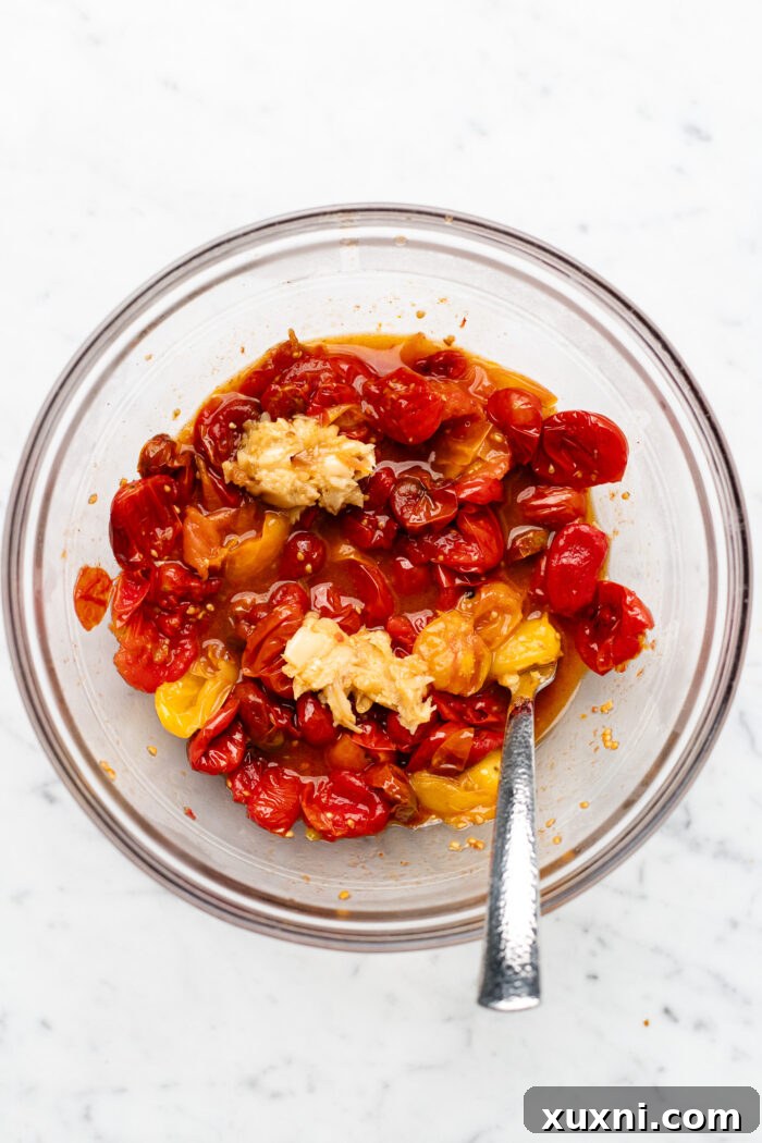 mashed tomatoes and garlic in a bowl