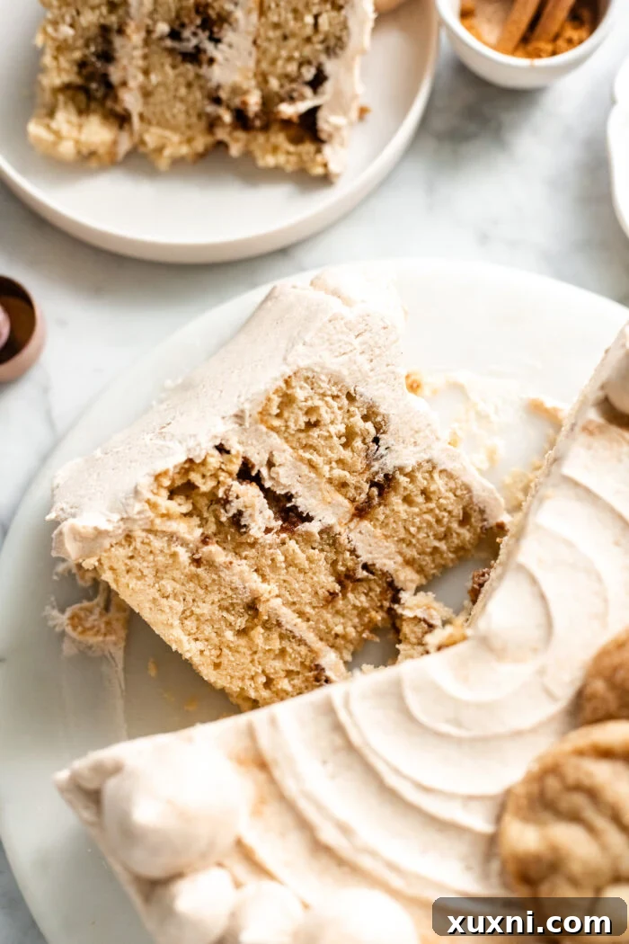 Close-up of a slice of vegan snickerdoodle cake on a board
