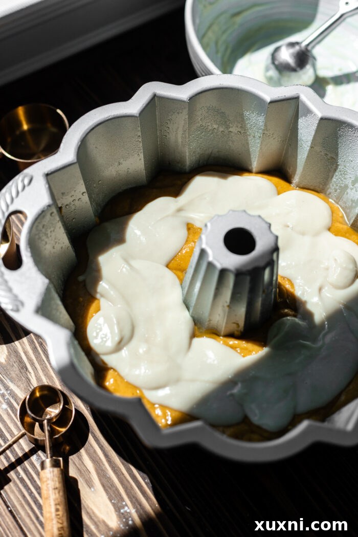 assembling the pumpkin bundt cake layers