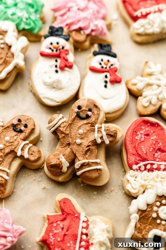 Soft Baked Frosted Dairy-Free Sugar Cookies with Vegan Cream Cheese Frosting 2 Frosted vegan cream cheese sugar cookies, beautifully decorated