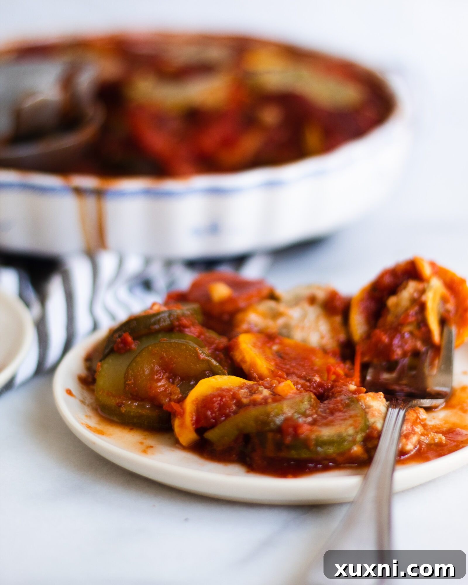 A partially eaten plate of ratatouille, a testament to its deliciousness
