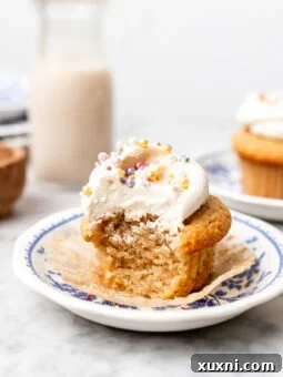 single serve vanilla cupcake on a plate