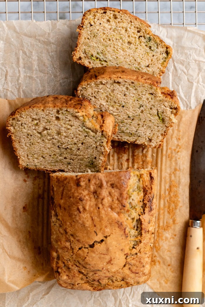 Unbelievably Moist Vegan Zucchini Bread 3 sliced zucchini bread loaf