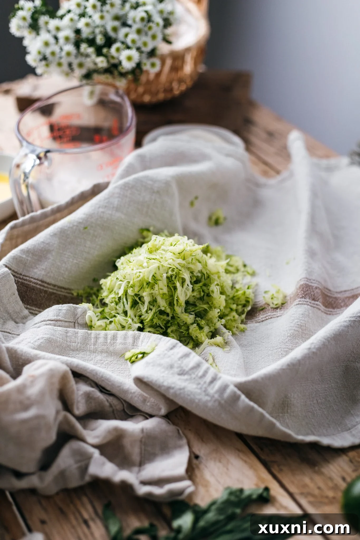 Unbelievably Moist Vegan Zucchini Bread 5 patted down zucchini before using in batter