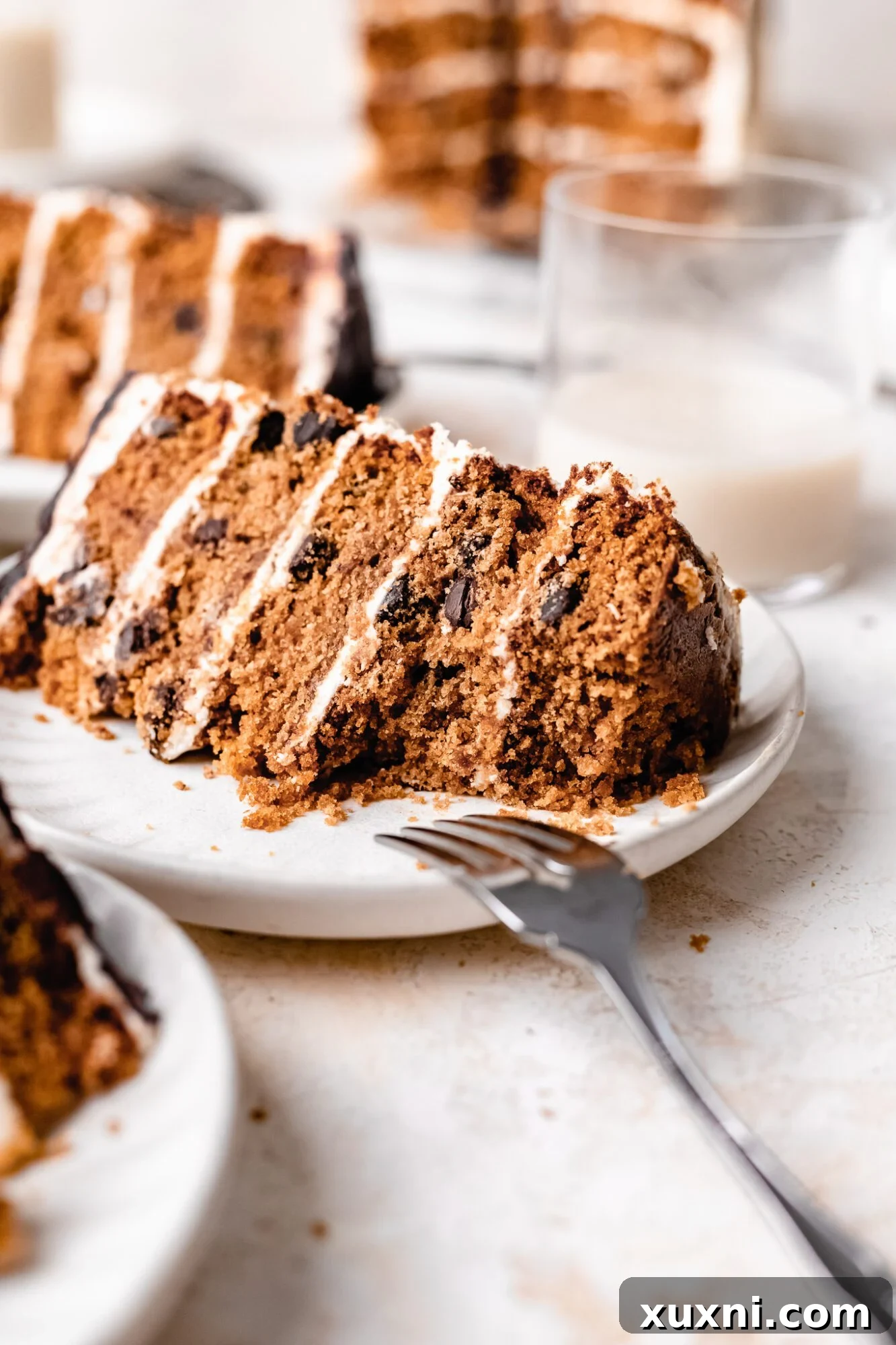 slice of vegan cookie cake on a white plate