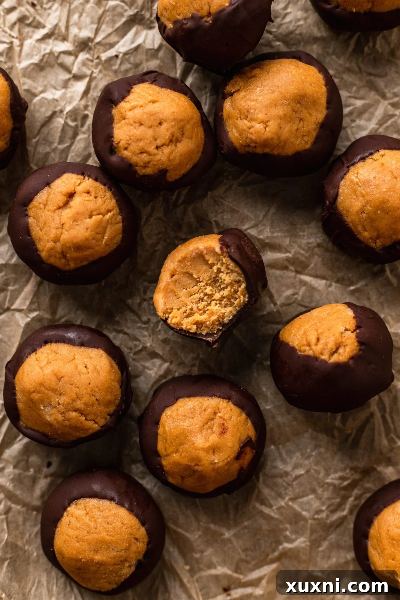 vegan peanut butter buckeyes on parchment paper
