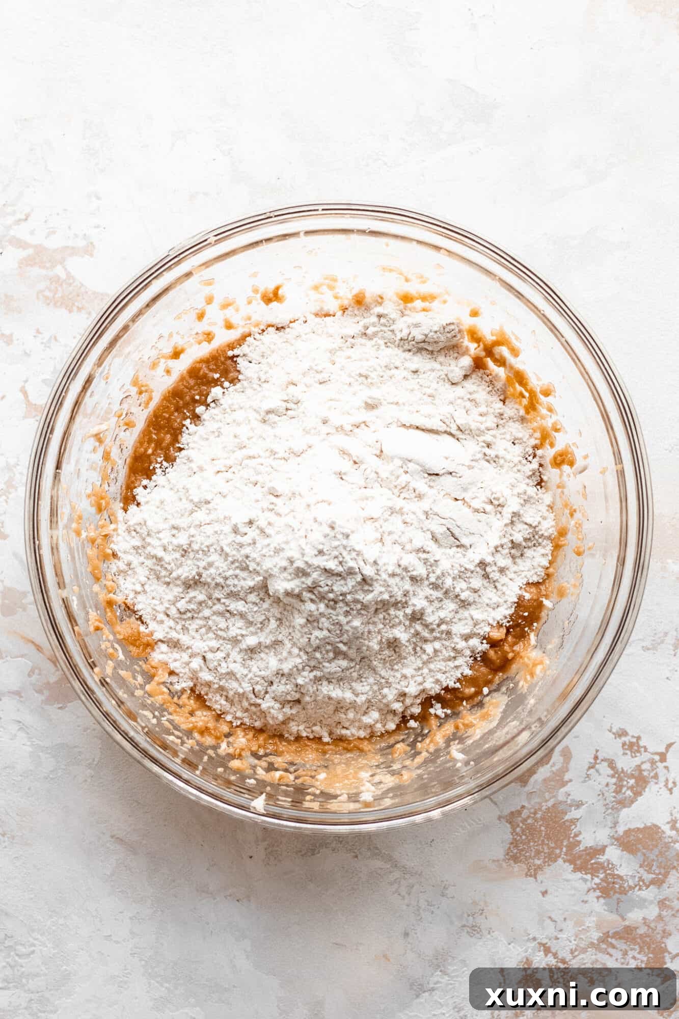 Peanut butter cookie batter in a bowl