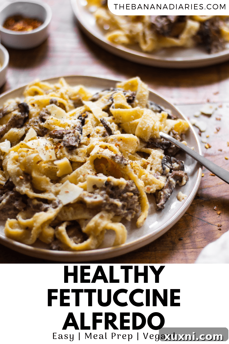 Guilt-Free Fettuccine Alfredo 12 Pinterest graphic for Healthy Fettuccine Alfredo, with an inviting image of the dish.