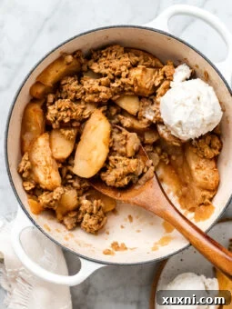 vegan apple crisp in a baking dish