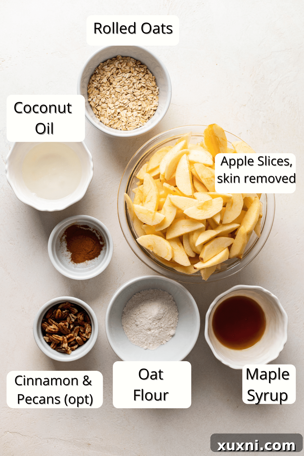 Quick Vegan Apple Crisp Naturally Sweetened 6 Array of healthy apple crisp ingredients laid out on a clean surface, ready for baking.