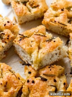 sliced vegan focaccia resting on top of each other
