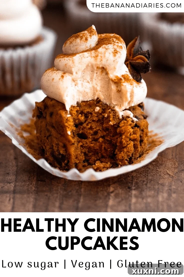 Pinterest pin graphic for Vegan Cinnamon Cupcakes, featuring a top-down view of the cupcakes with a descriptive text overlay.