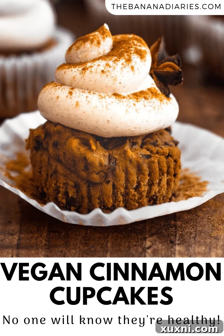 Pinterest pin graphic for Vegan Cinnamon Cupcakes, showing an array of cupcakes with text promoting the recipe.