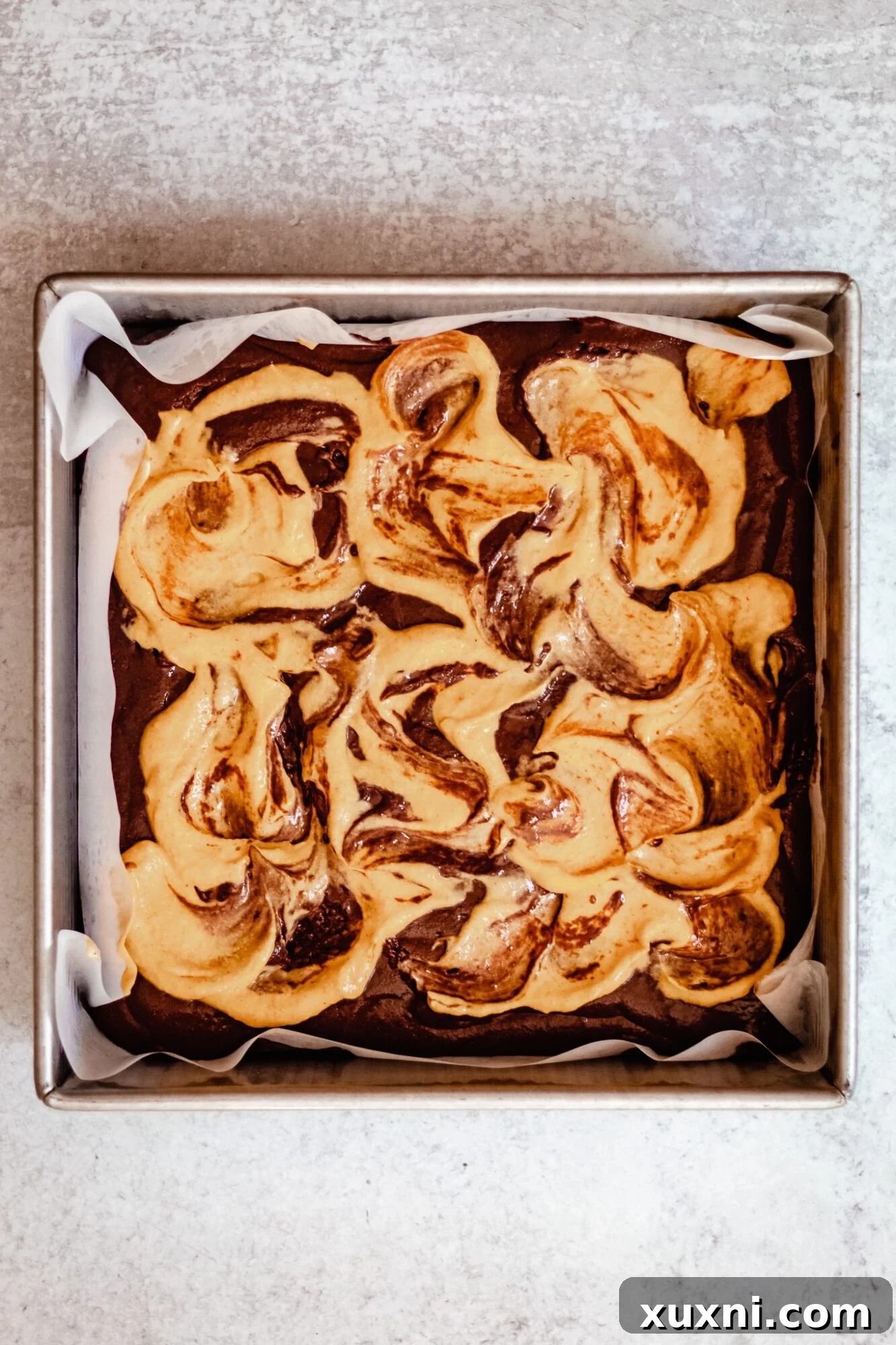 Finished pumpkin and chocolate swirl in the brownie batter, ready for baking.