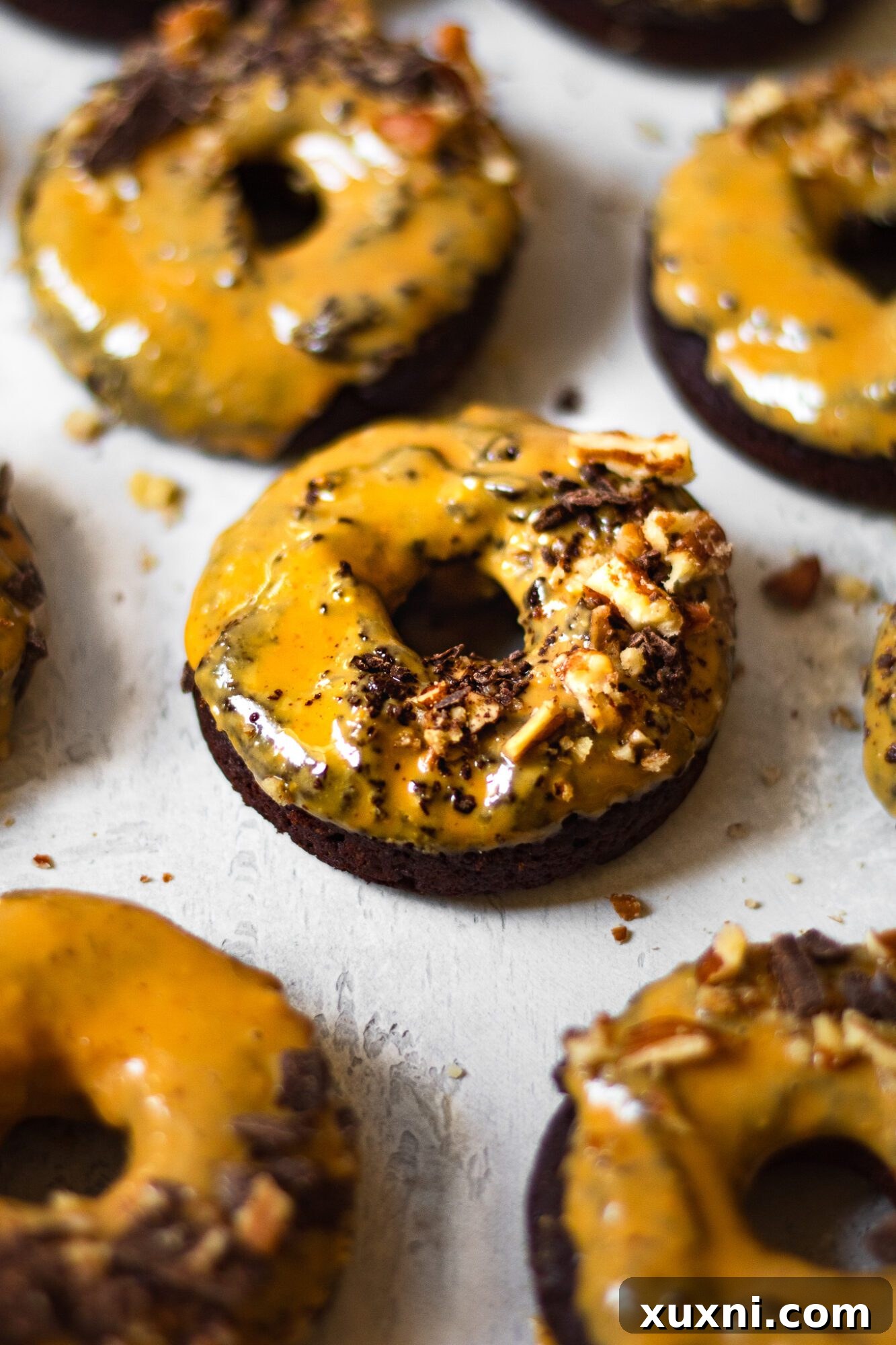 Irresistible baked chocolate donuts with peanut butter glaze