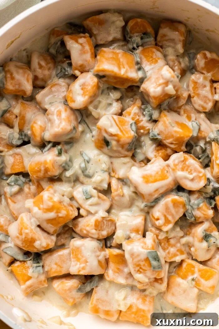 Close up of vegan sweet potato gnocchi in sauce pan