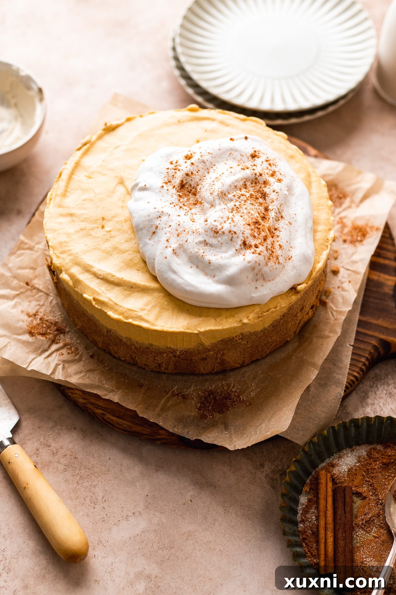 The assembled no-bake vegan pumpkin cheesecake, chilling to perfection.