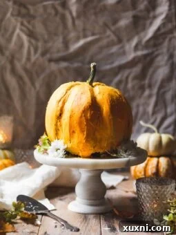 pumpkin cake on marble cake stand