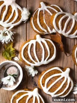 vegan pumpkin sugar cookies with simple vanilla icing