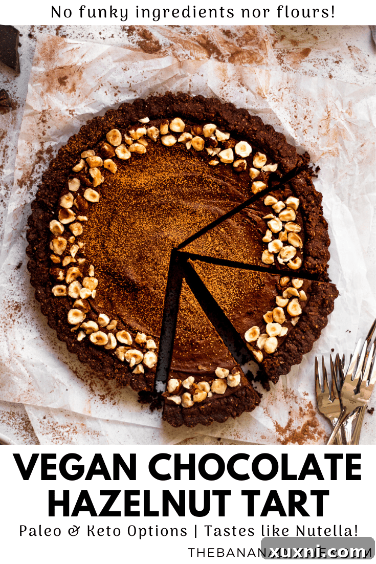 Final Pinterest image for vegan chocolate hazelnut tart, showing a beautifully plated slice