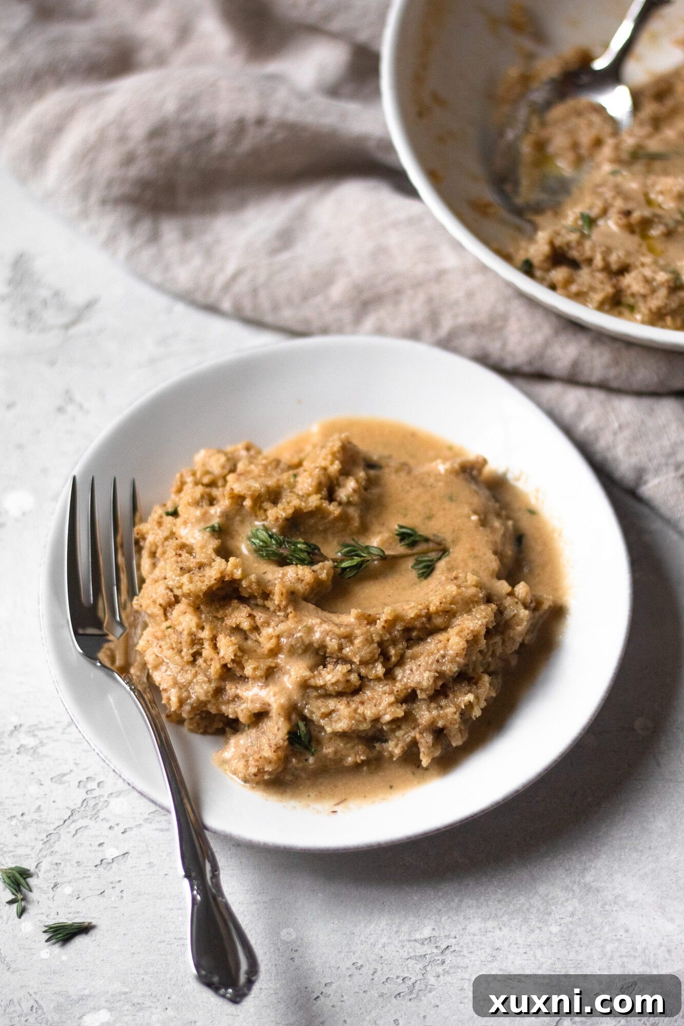 plate of vegan gravy with mashed cauliflower