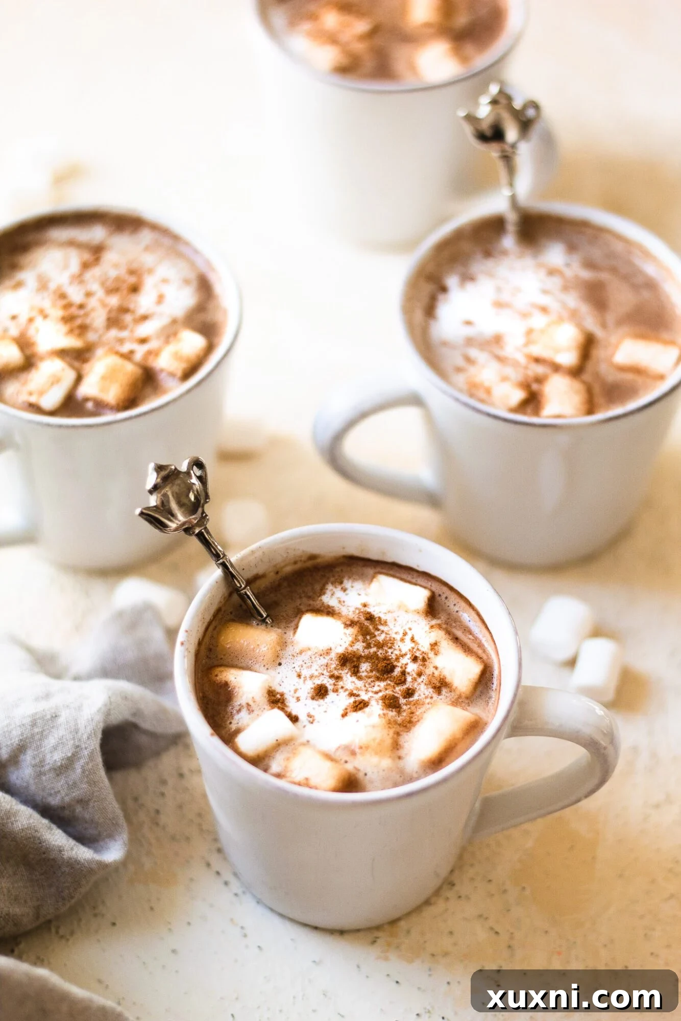 Multiple mugs of healthy homemade mocha lattes, ready to be enjoyed