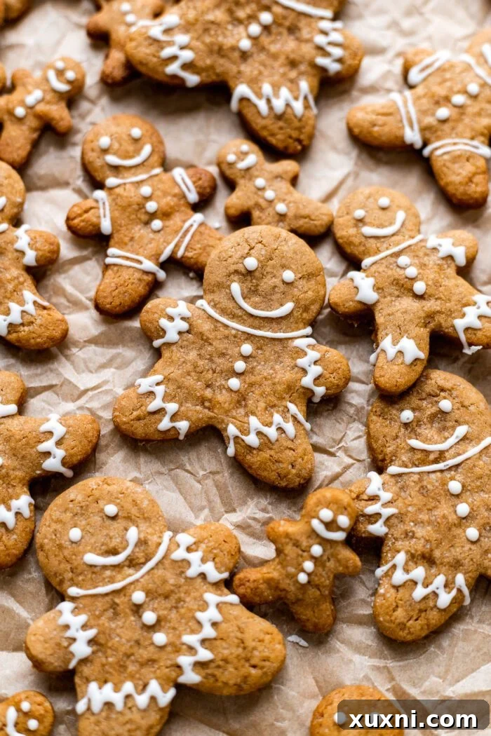 Soft & Chewy Vegan Gingerbread Cookies (Gluten Free!) on a parchment paper