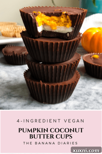 A stack of Vegan Pumpkin Coconut Butter Cups with a pumpkin in the background, symbolizing autumn.