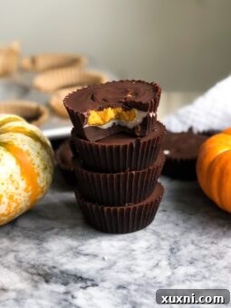 Vegan Pumpkin Coconut Butter Cups in a muffin tin
