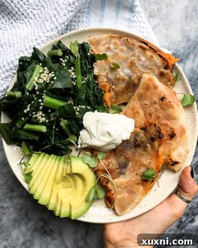 Close-up of the vegan sweet potato quesadilla filling with beans and spices.