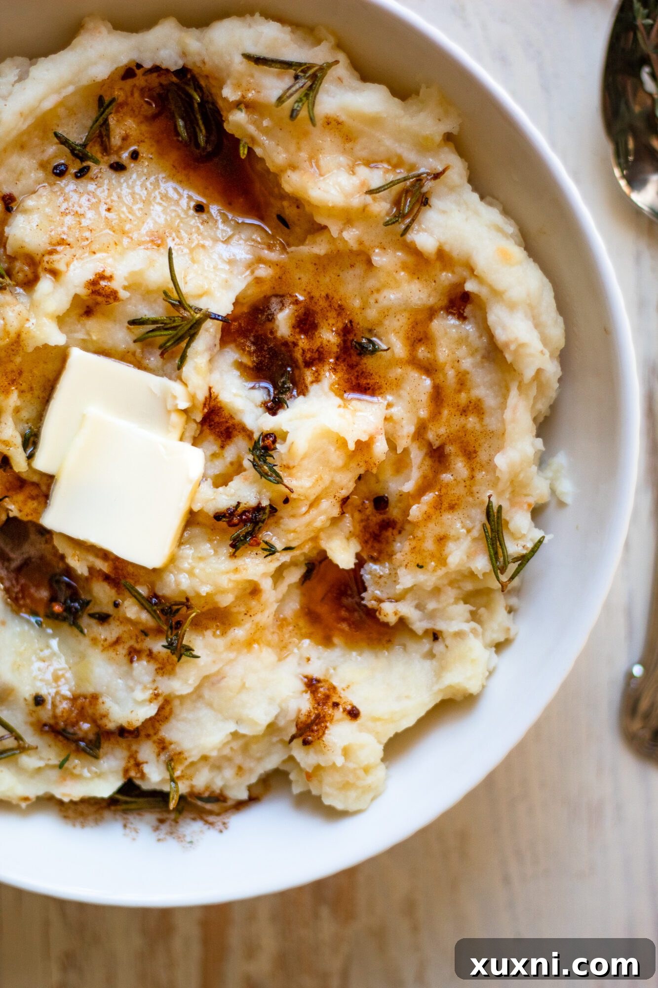 close up view of creamy mashed potatoes in a bowl