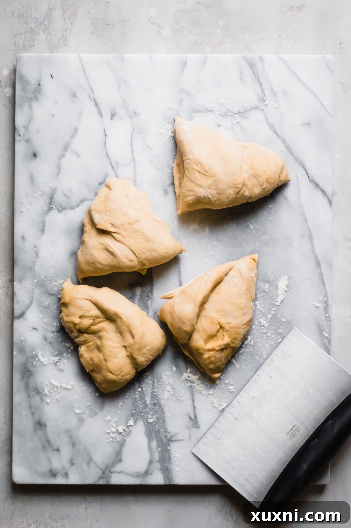 Dough precisely cut into four equal quarters