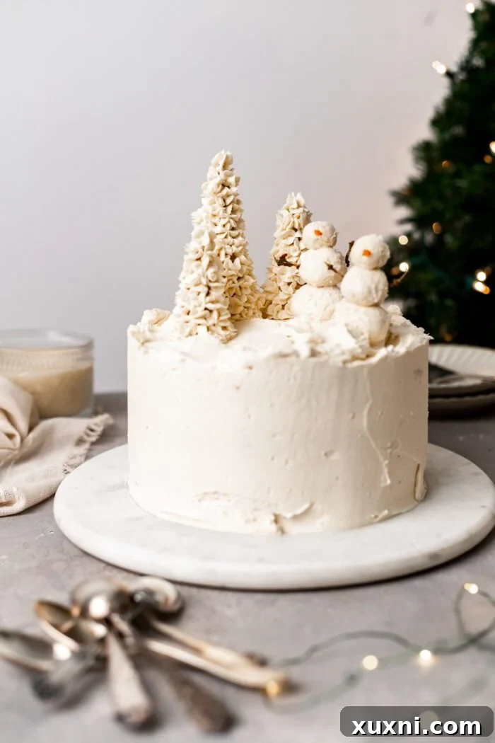 Vegan Eggnog Cake (Gluten Free) on a marble platter