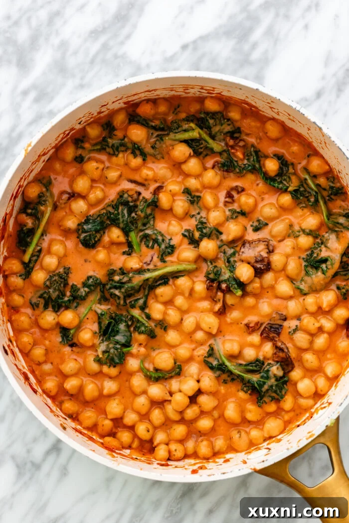 A close-up view of the finished Marry Me Chickpeas dish, beautifully garnished and ready to be enjoyed.