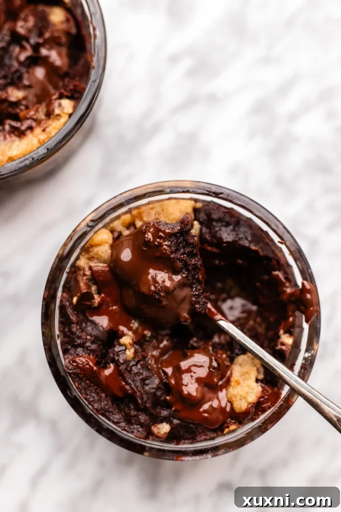 scooped brookie cookie pie on marble table