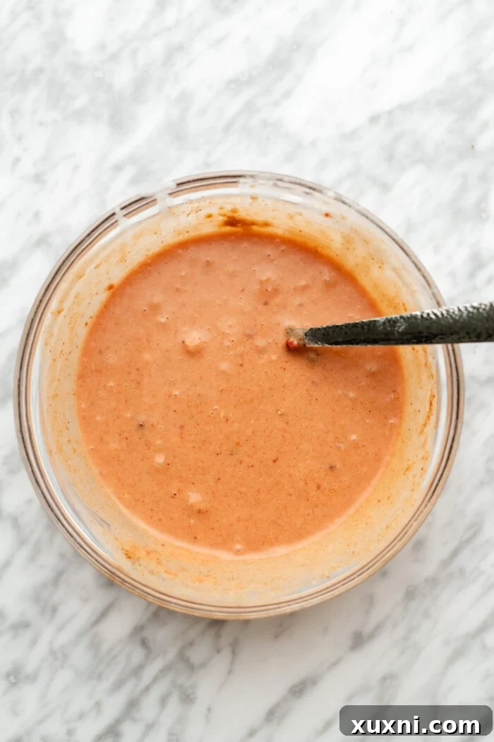 mixing the coconut sauce