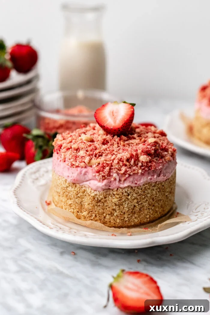 vegan strawberry crunch cheesecake on a plate