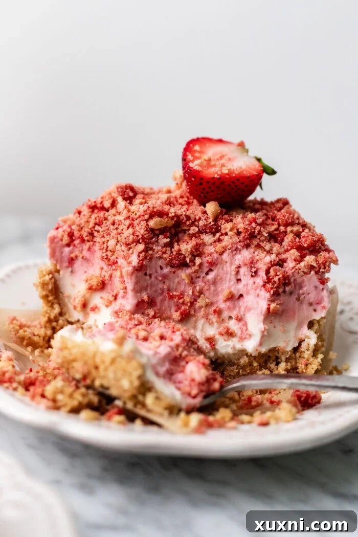 bitten strawberry crunch cheesecake